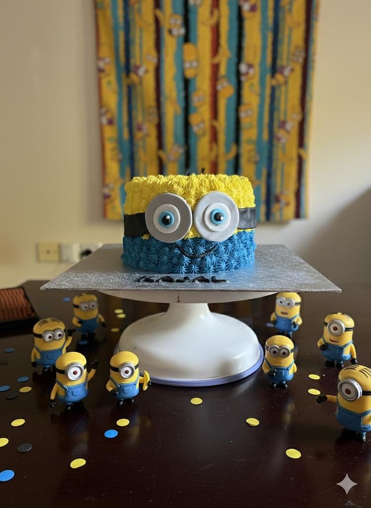 Minions themed birthday cake by Prexa at Cosy Cafe Harleston